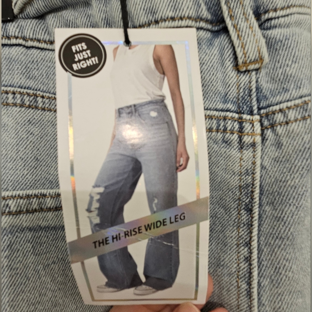 BNWT Wide Leg Jeans with cute and subtle white butterfly design.